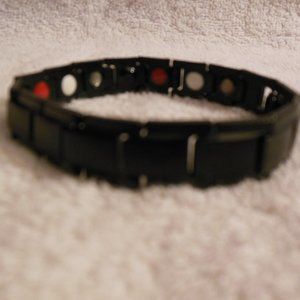 Metal link bracelet with interior magnetics